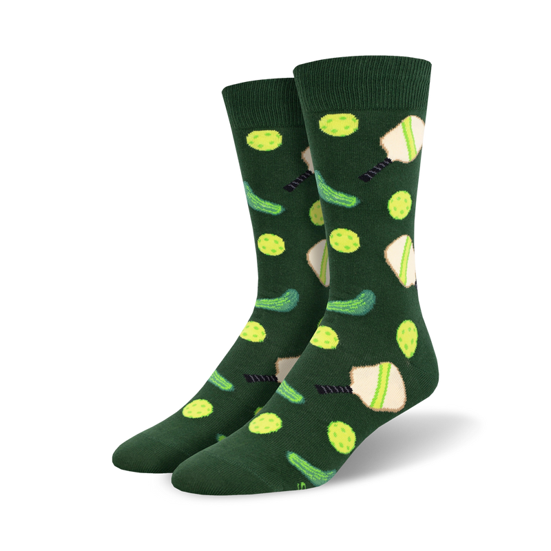 Pair of crew socks in hunter green with a repeating pattern of lime green pickleballs, paddles, and pickles.