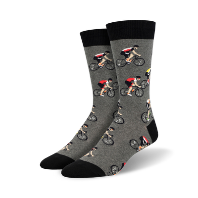 Pair of crew socks; gray with repeating cyclist pattern, black cuffs; or light blue with navy cuffs and same cyclist pattern.