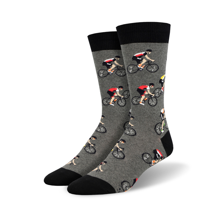 gray cycling socks for men with a pattern of red and yellow male cyclists.  