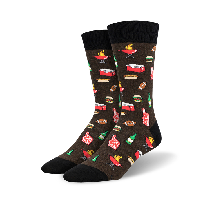 Pair of crew socks in brown and green, featuring a pixelated design of burgers, hot dogs, beer, and footballs.