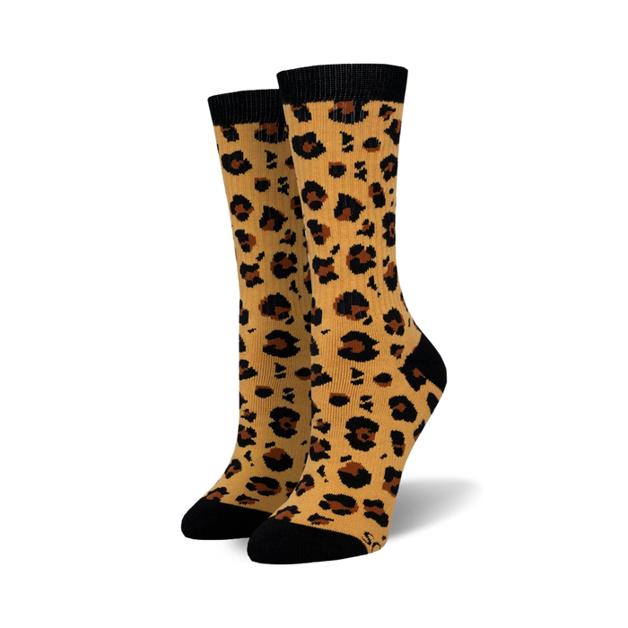 womens leopard print crew socks with a recurring allover pattern in brown and tan.   }}