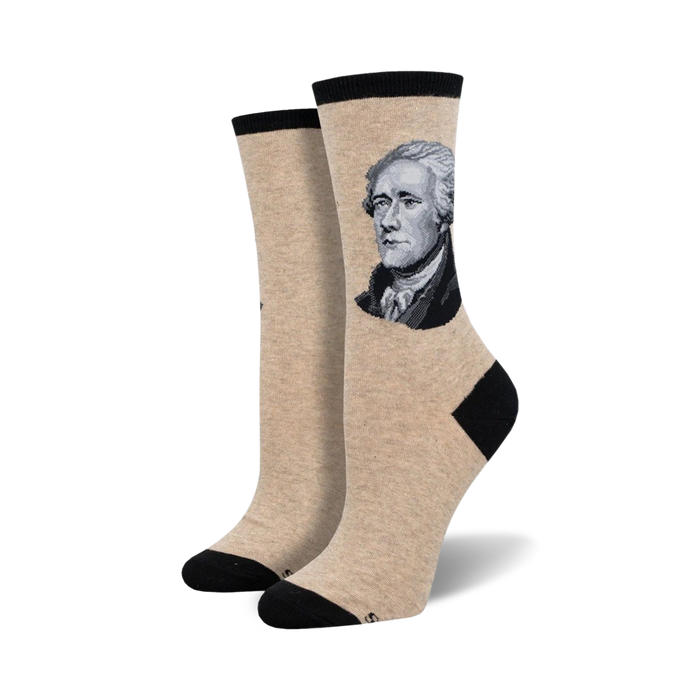 Beige crew socks with a black cuff, featuring a grayscale portrait of Alexander Hamilton on one side. }}