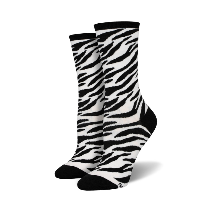  women's zebra print crew socks with a black band and black toe and heel.   }}