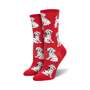 Pair of red crew socks with a repeating pattern of adorable black-and-white Dalmatian puppies.