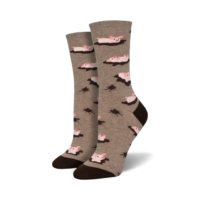 womens mid-calf crew socks with cartoon pigs laying in mud puddles.    }}