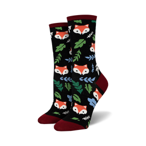 womens crew-length socks with black background and cartoon fox pattern in red, orange, green and blue.  