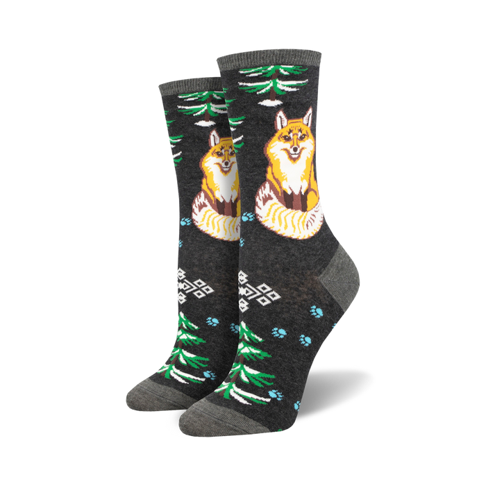 dark gray crew socks with a pattern of green pine trees, red mushrooms, and a cartoon fox sitting in the snow.   }}