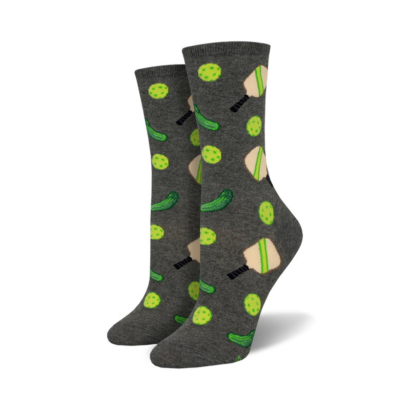 Pair of crew socks in grey with a playful design of lime green pickleballs and paddles. Fun and sporty!