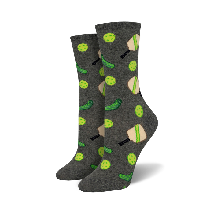 gray crew socks with a pattern of green pickleballs and black and tan pickleball paddles.   }}