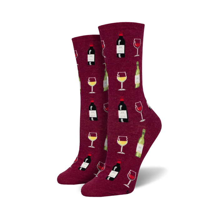 Pair of women's crew socks. Burgundy background with repeating pattern of wine bottles and glasses.