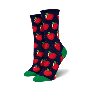 Pair of crew socks with a red apple pattern on a navy blue background and green cuffs.
