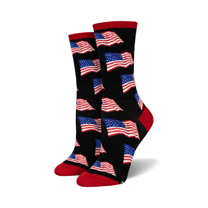 Pair of crew socks with a black background and repeating American flag pattern in red, white, and blue. Red and navy accents at the cuffs. }}