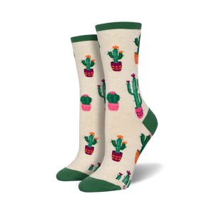 Cream crew socks with a fun pattern of cacti in pink and green pots. Green and cream cuffs.