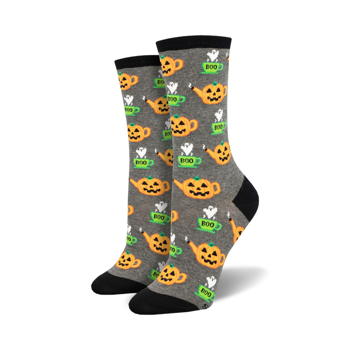 womens gray crew socks with allover halloween themed design of pumpkins, ghosts, and teapots in orange, white, black, and green   