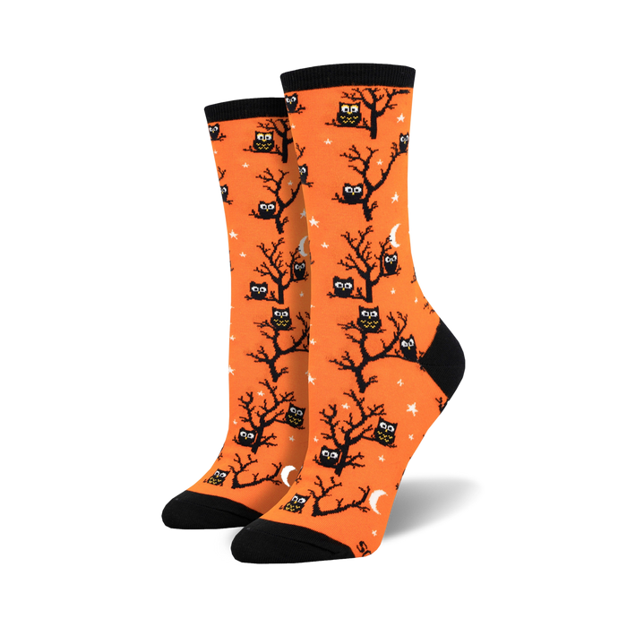 owl print crew socks in orange with black trees, crescent moons, and a starry night background to add a touch of whimsy to your everyday wardrobe.   }}