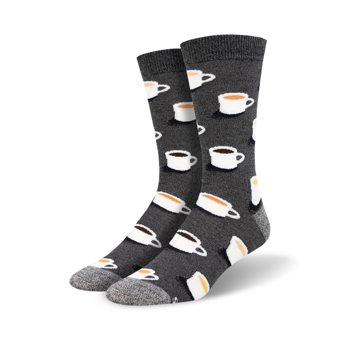 Pair of crew socks in dark gray with a repeating pattern of coffee cups in white and beige. }}