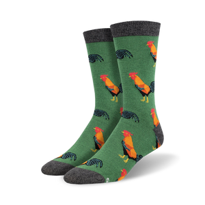 Pair of crew socks with a green background and colorful rooster design.  The socks have a grey cuff.