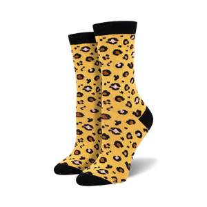 leopard print bamboo crew socks: women's, black & brown spots on mustard yellow background  