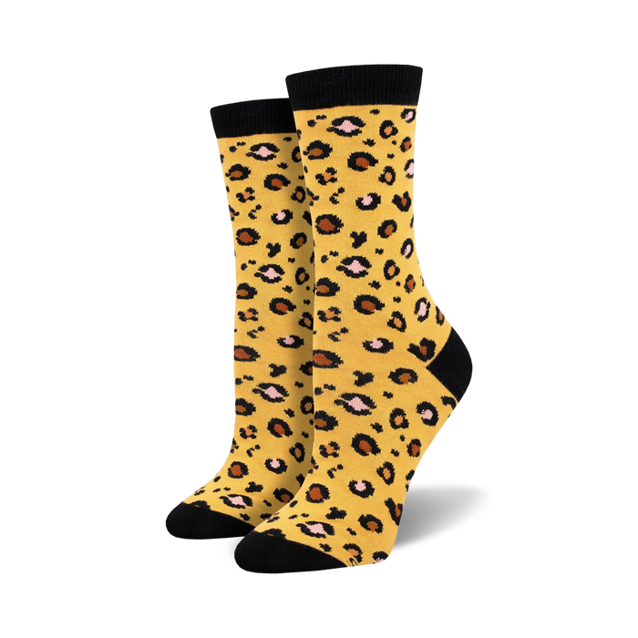 leopard print bamboo crew socks: women's, black & brown spots on mustard yellow background  