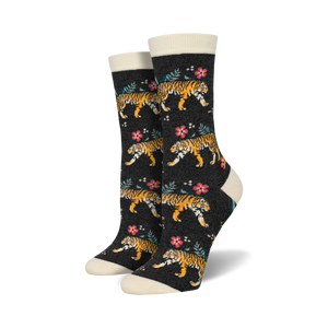 Pair of women's crew socks. Dark background with orange tigers and pink flowers.  Cream-colored cuffs.