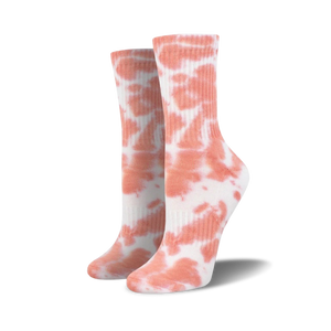 Pair of coral tie-dye athletic crew socks on a white background.