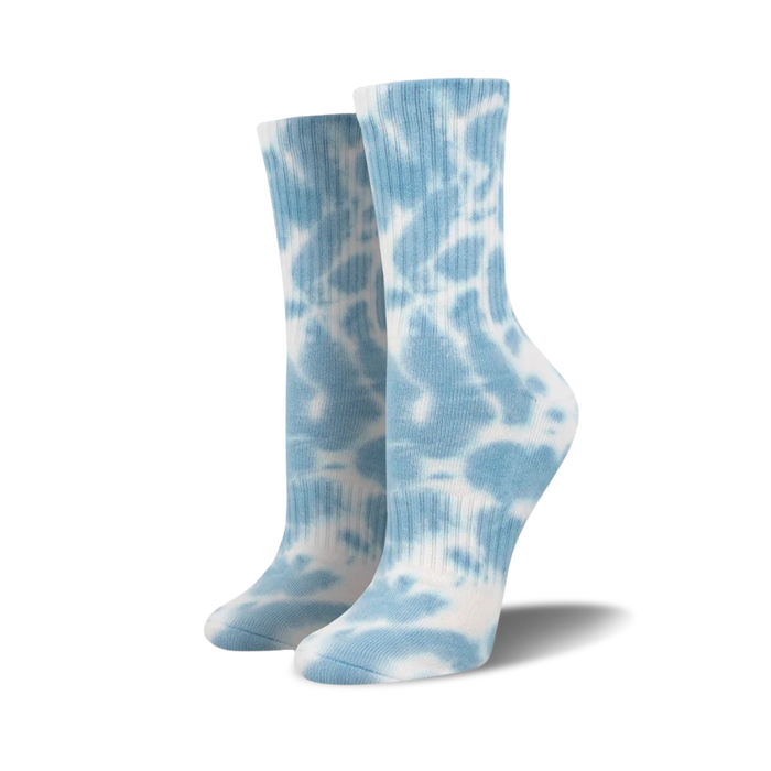Pair of light blue tie-dye athletic crew socks on a white background.