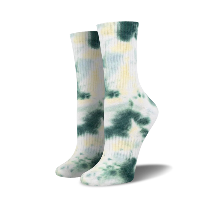 Pair of dark green and yellow tie-dye athletic crew socks on a white background.