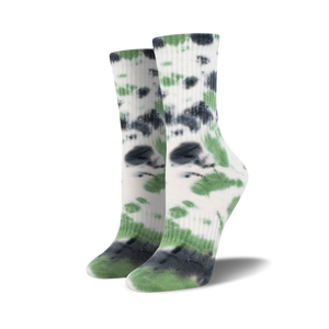 Lifestyle shot of a person working out wearing coral tie-dye socks.