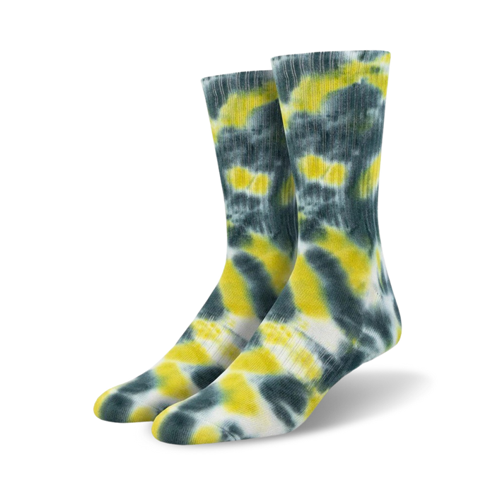 Flatlay image showing multiple pairs of tie-dye athletic crew socks in various colors.