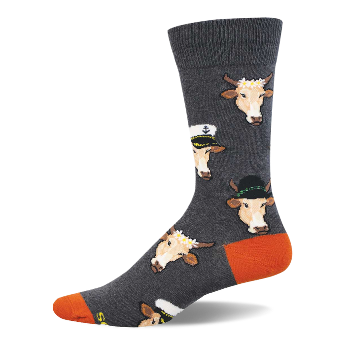 Grey crew socks with repeating pattern of light brown cow faces in sailor hats, fedoras, and flower crowns. Orange heel and toe. }}