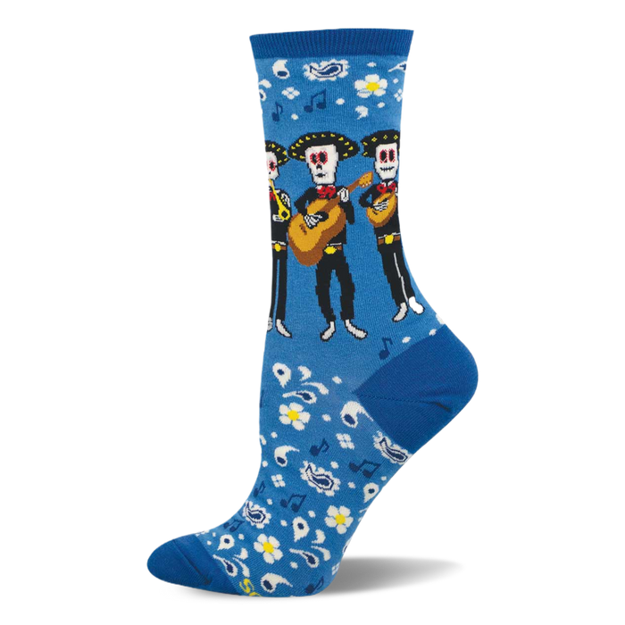 Bright blue crew socks with a pattern of skeleton mariachi musicians, guitars, white flowers, paisley, and music notes. }}