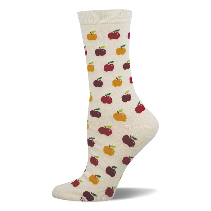 Cream crew socks with a repeating pattern of red, dark red, and yellow pixelated apples, each with a green stem. }}