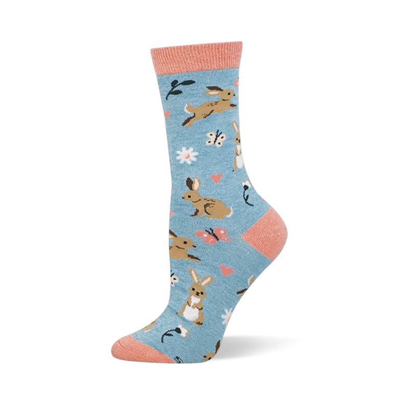 Light blue bamboo sock with brown bunnies, pink hearts, butterflies, white flowers, and soft coral accents at the top.