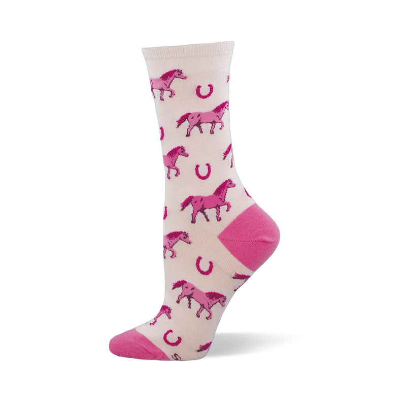 Crew sock with a pale cream background, bright pink pixelated horses, scattered horseshoes, and solid pink heels and toes.