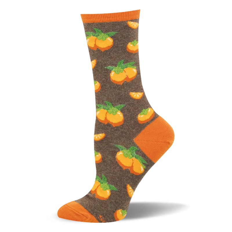Heather brown crew sock showing paired orange persimmons with green leaves, fruit slices, and a bright orange heel and toe.