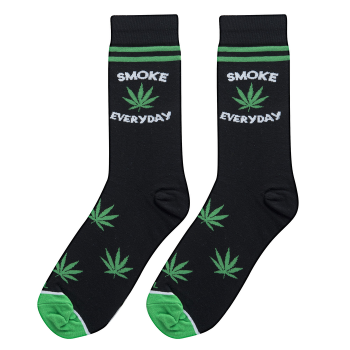 Close-up shot showcasing the detail of the 'Smoke Everyday' socks, highlighting the vibrant green marijuana leaves and text on black fabric.