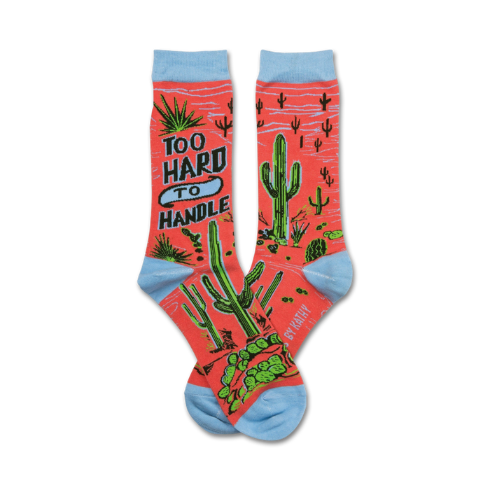 Pair of coral crew socks with cacti and 'Too Hard To Handle' text. Light blue cuffs. }}