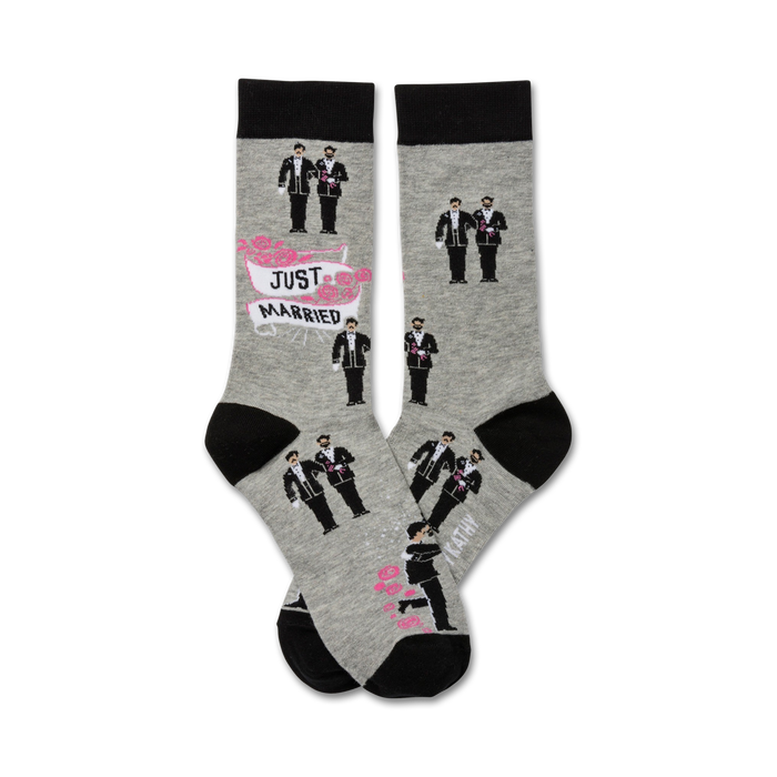 mens crew socks in gray with black toe, heel, and cuff. pattern of two grooms in black suits holding hands. 'just married' banner and 'two grooms' printed on sole.   }}