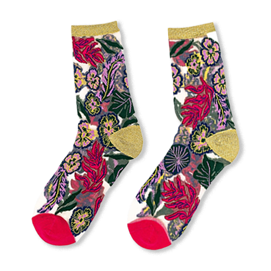 Sheer socks displaying bright flowers, green leaves, magenta toes, solid heels, and sparkly gold cuffs on a dark background.