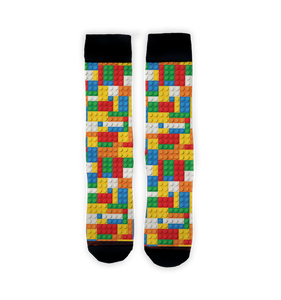Flatlay showcasing two Brick Toys socks, highlighting the colorful Lego-inspired design.