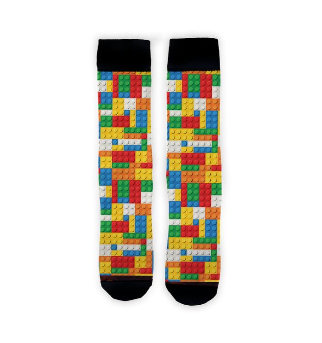 Flatlay showcasing two Brick Toys socks, highlighting the colorful Lego-inspired design.