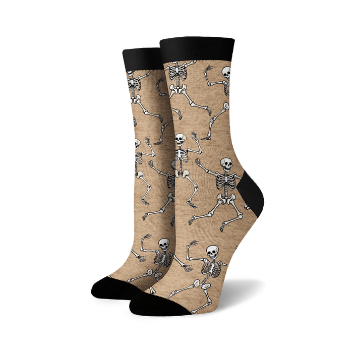 Pair of crew socks; beige and black options; dancing skeleton pattern.