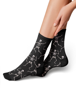 Close-up shot: Detail of the beige 'Dead Man's Party' sock pattern.