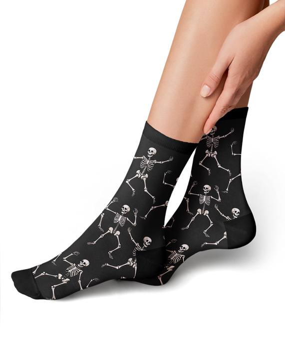 Close-up shot: Detail of the beige 'Dead Man's Party' sock pattern.