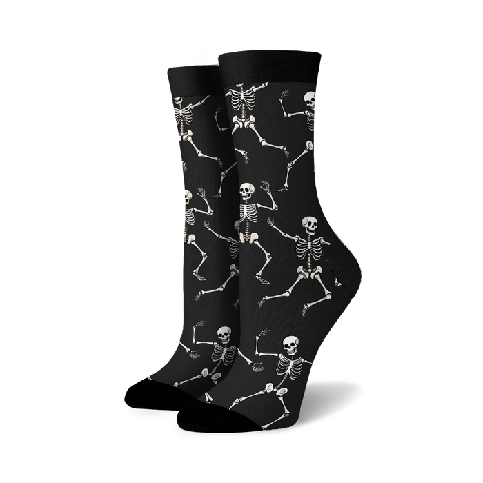 Lifestyle shot: Beige 'Dead Man's Party' socks on a woman's legs.