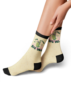 Another lifestyle shot of a person wearing the 'I'm Kind of a Big Dill' socks, emphasizing the fit and design.