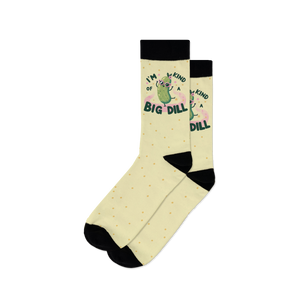 Pair of pastel yellow crew socks with a cool pickle graphic and the text 'I'm kind of a big dill'.  Small yellow dots are scattered across the sock.