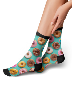Lifestyle shot of a woman's legs wearing the donut socks, showing how they look when worn.