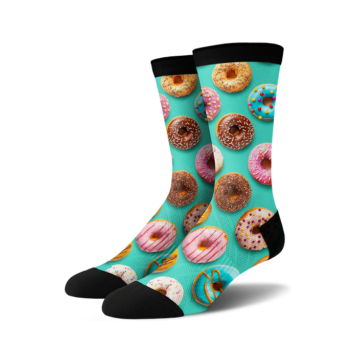 Crew socks with a teal background and colorful donut print.  Donuts in pink, blue, chocolate, and yellow are depicted.