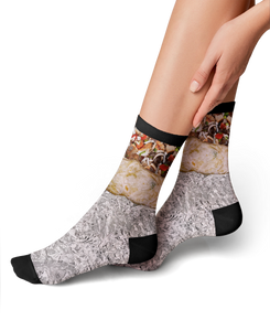 Lifestyle shot showing the burrito socks on a person's feet.
